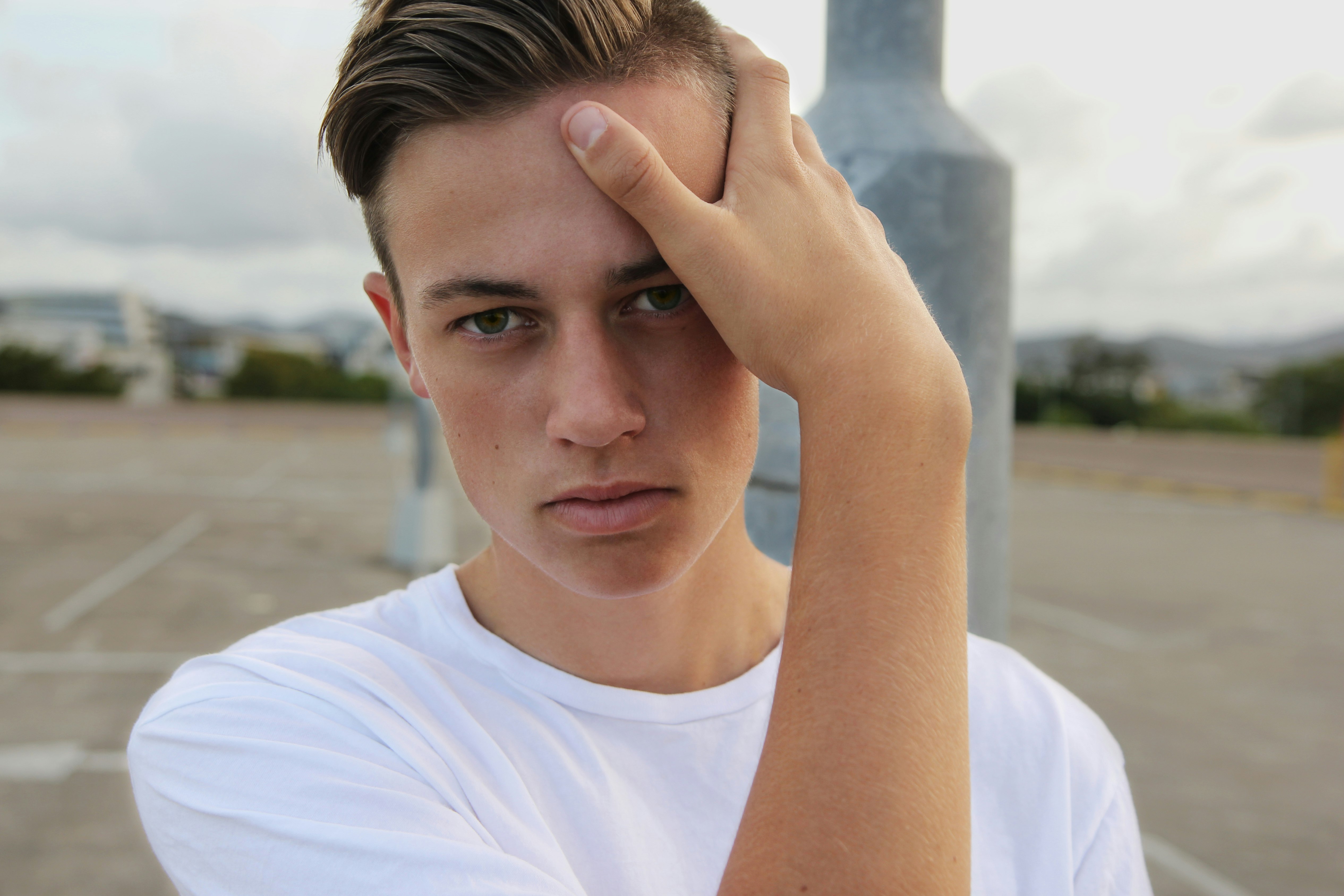 men's white crew-neck top close-up photography